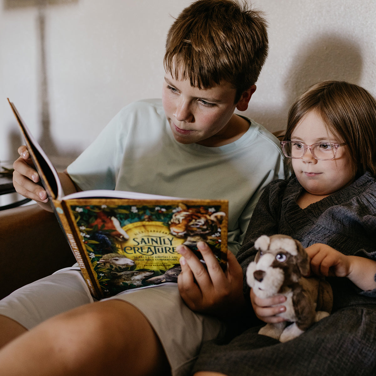 Saintly Creatures Son and Daughter Reading Book